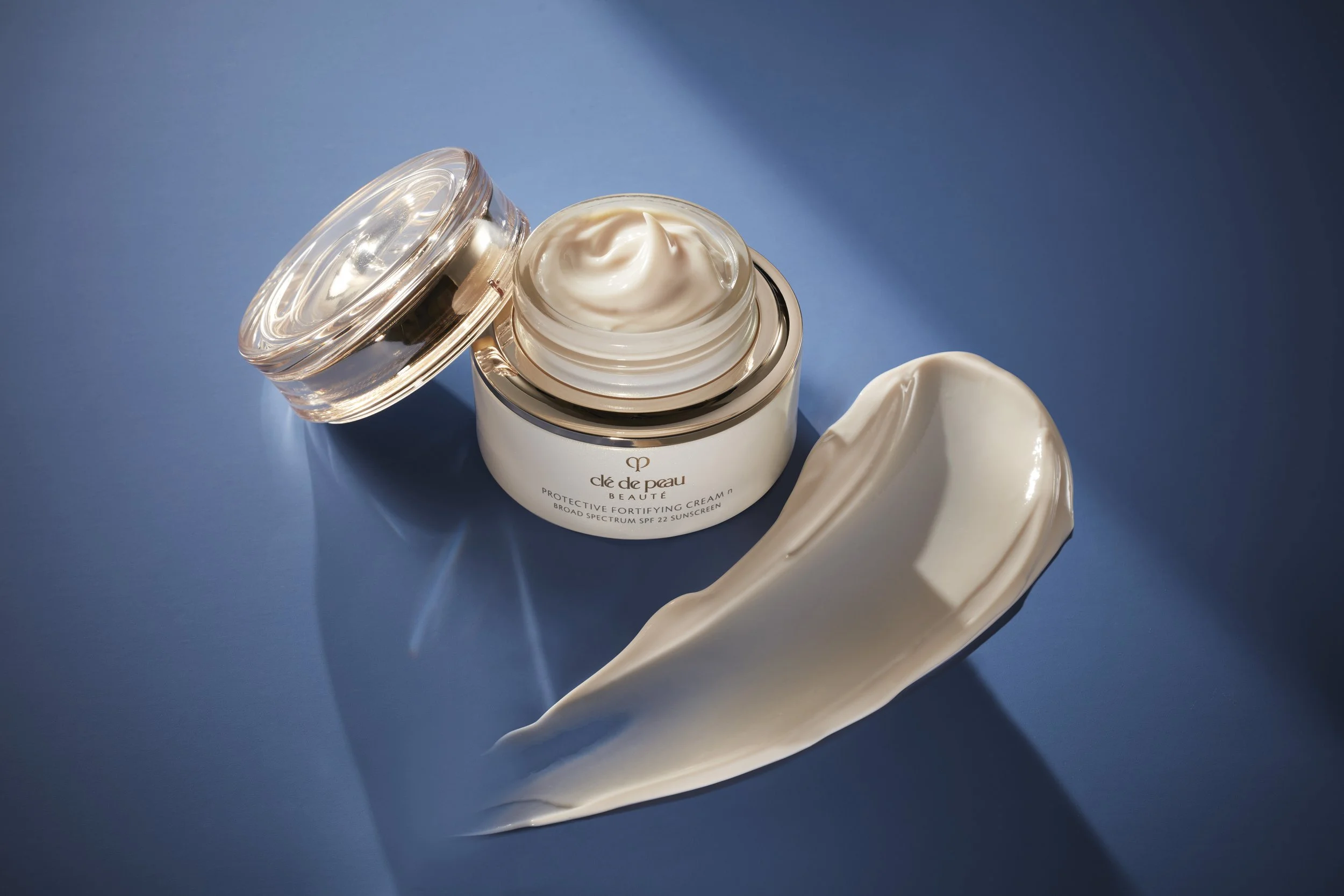 Close-up detail of luxurious smooth white skincare moisturizer cream texture