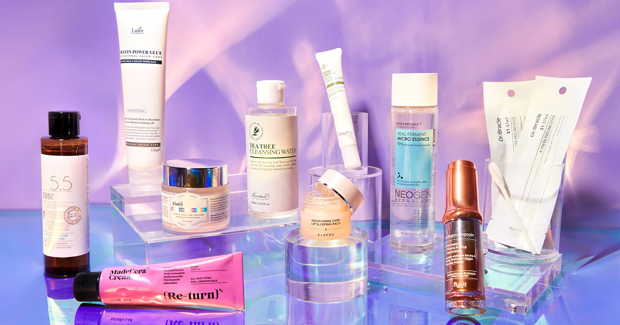 Aesthetic K-beauty skincare products, creams, and glass jars on a soft neutral background